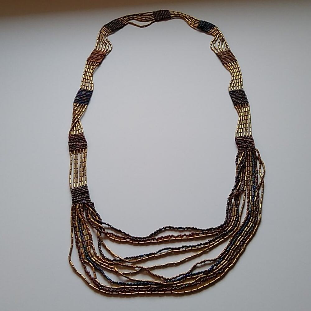 42 inch Beaded Iridescent necklace. Versatile for any outfit